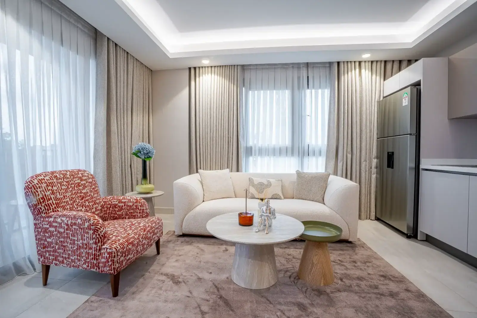 Lounge area in a Grand Mirage apartment, Airport Residential