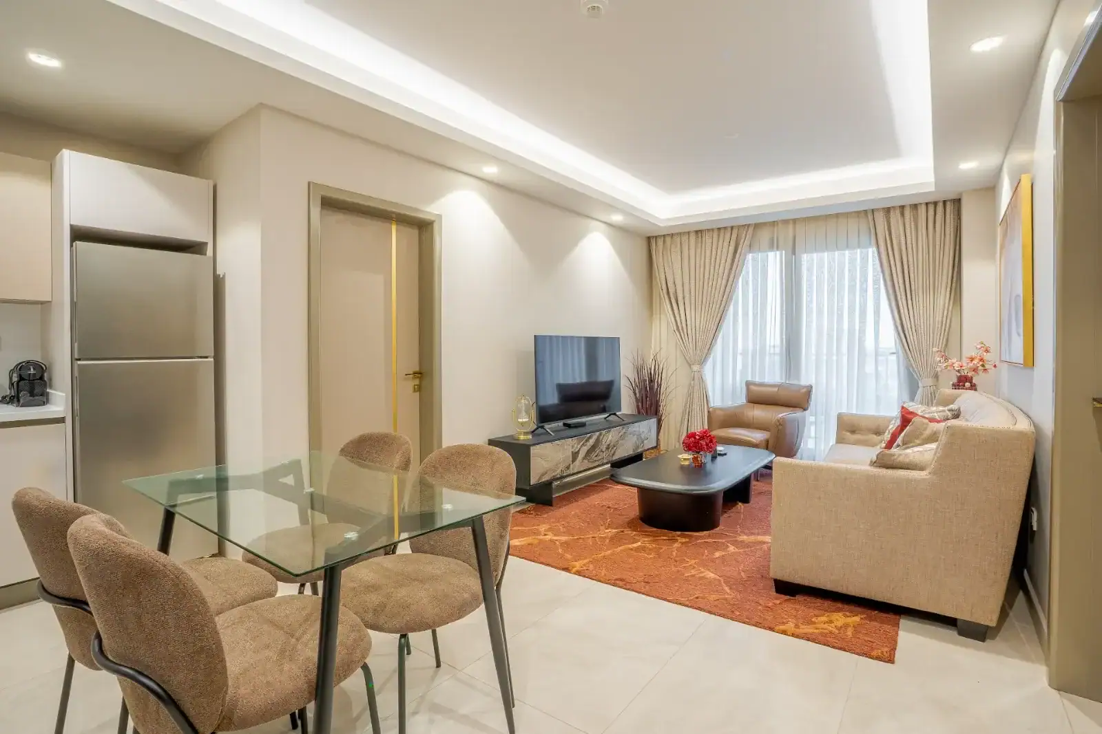 Living and dining area of a Grand Mirage apartment