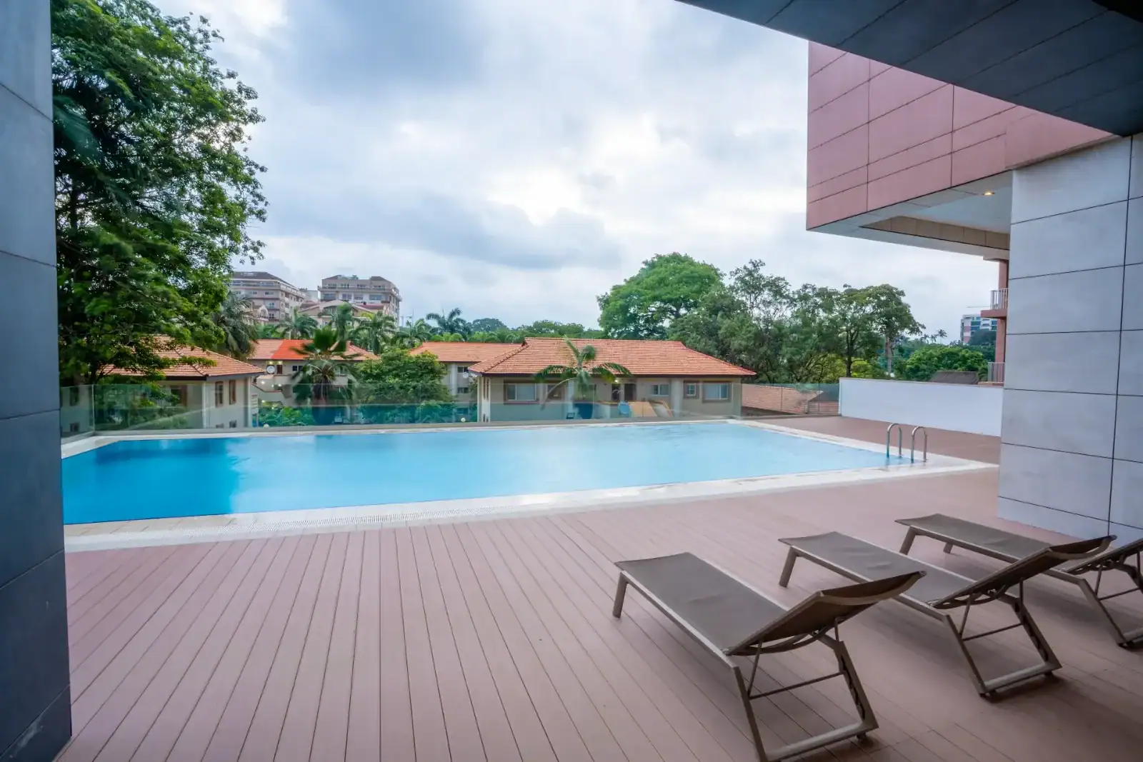 Swimming pool and sun deck at Grand Mirage, Airport Residential